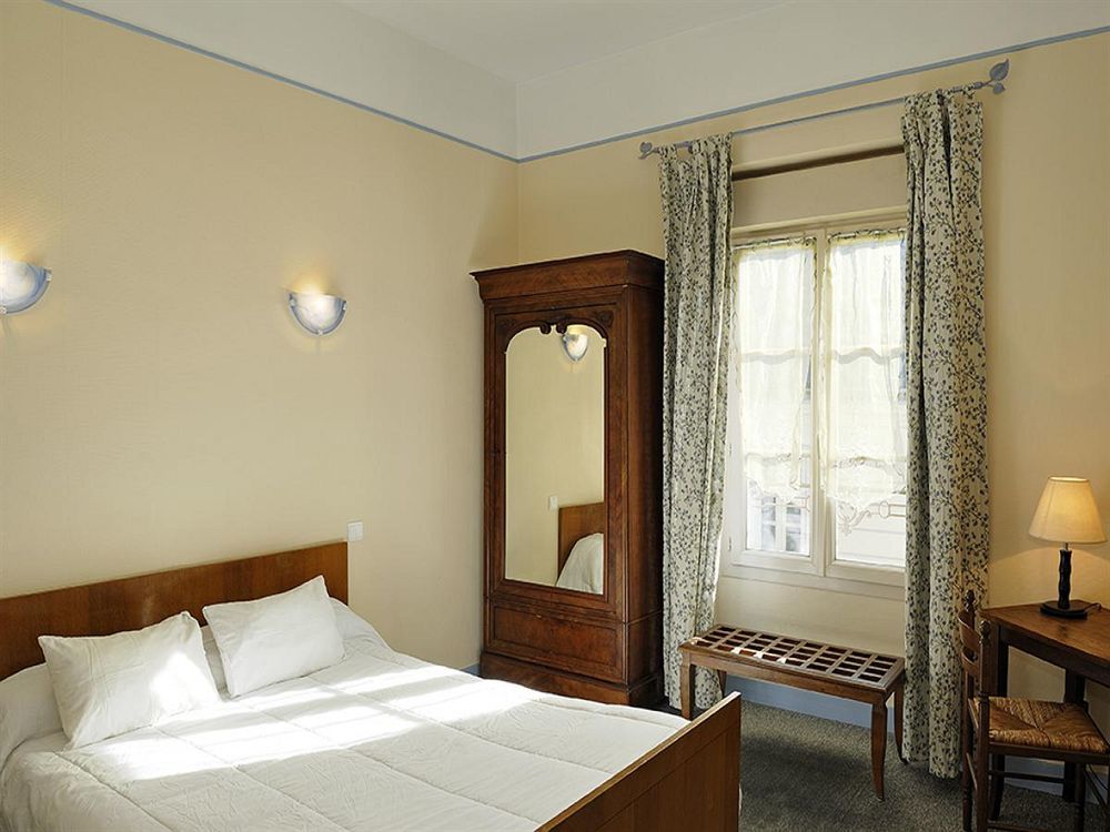 Logis Hostellerie Du Cheval Blanc Сент-Мор-де-Турен Екстер'єр фото